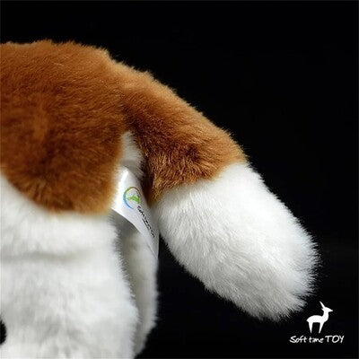 Zoom sur la queue de la Peluche réaliste chien Saint-Bernard