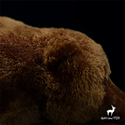 Très belle peluche réaliste de l'ours grizzly qui reflète la splendeur de la nature.