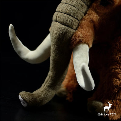 Très belle peluche réaliste, d'un mammouth venant tout droit de Jurassic Park.