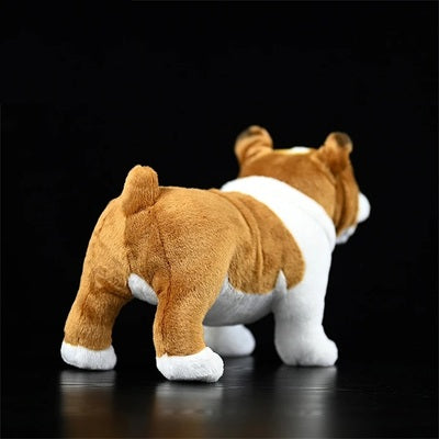 Dans l'univers enchanté d'Animalia, une peluche de Bouledogue anglais éveille un réalisme charmant, capturant l'essence d'un fidèle compagnon canin.